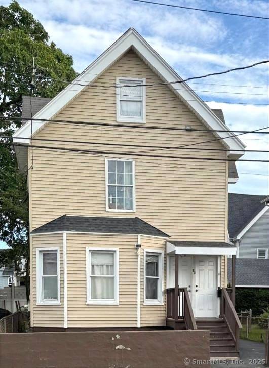 Newly renovated two family with third floor space strong income potential.