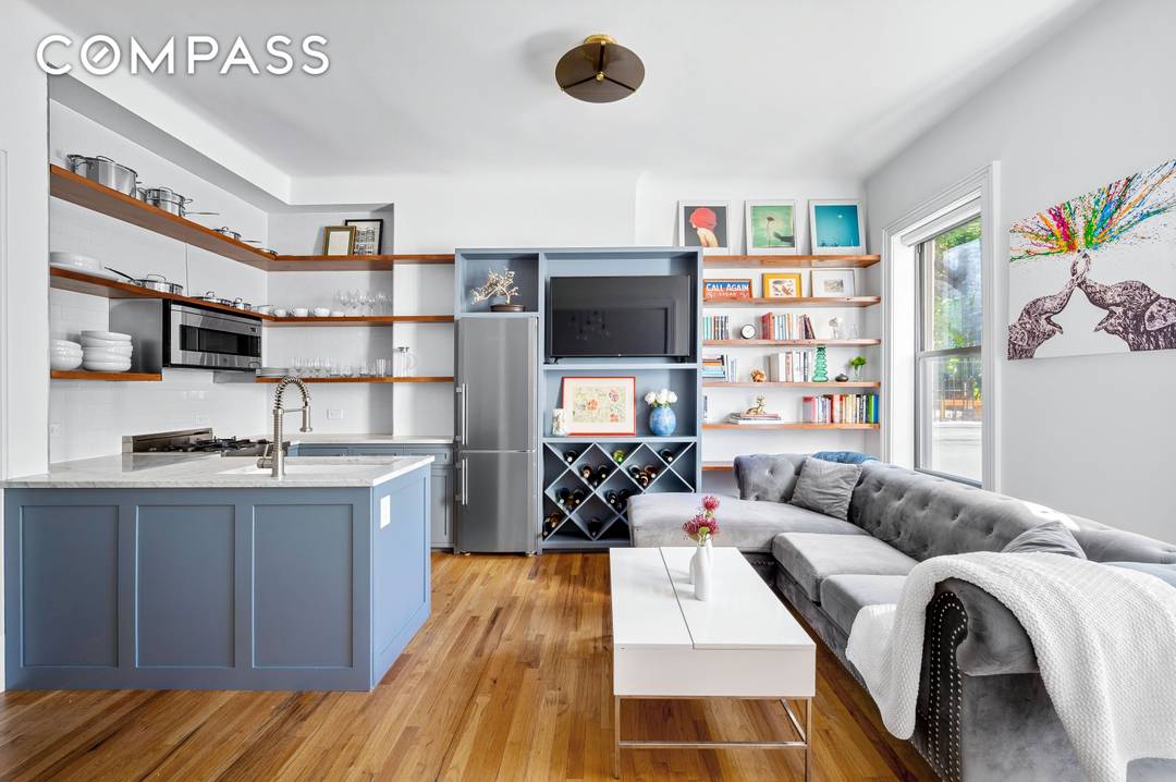 On a landmarked, double wide block rests a meticulously maintained pre war brownstone building.