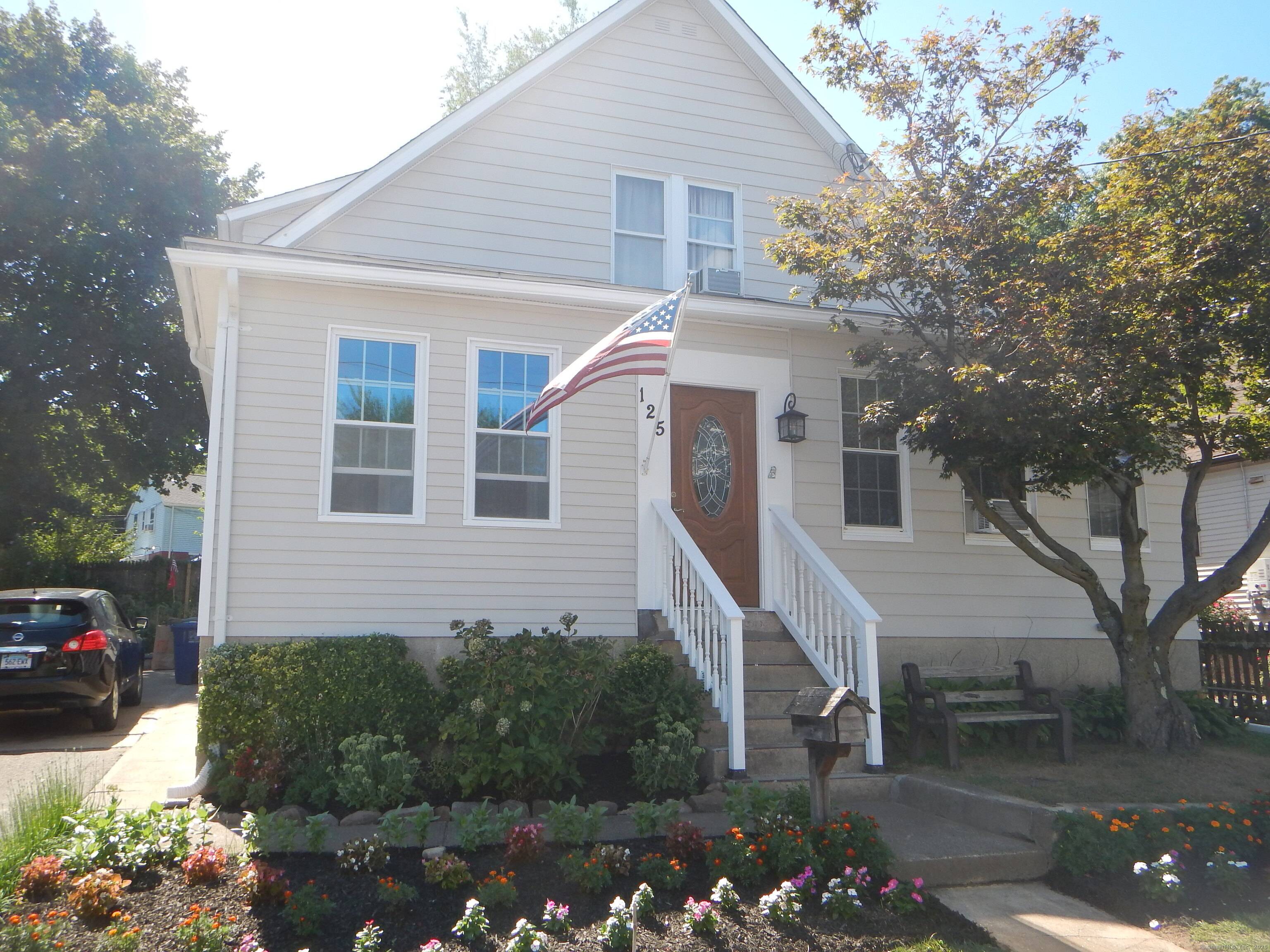 Welcome Home ! This Cape Cod Colonial styled home is absolutely magnificent.