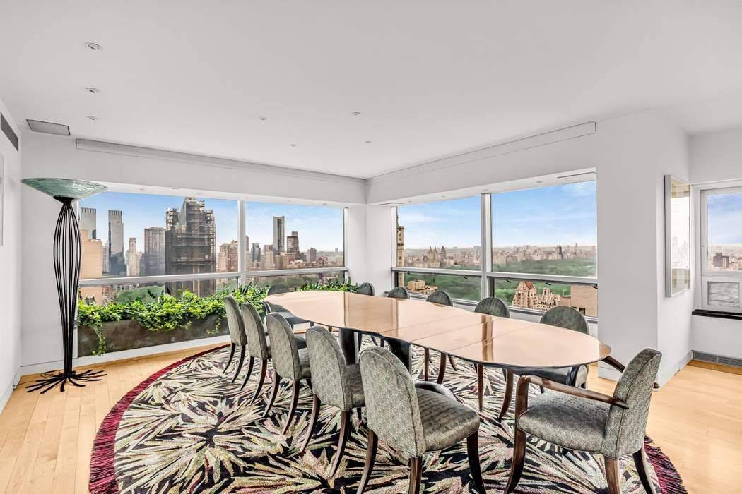 Experience unparalleled luxury in this magnificent 17 room Penthouse tower residence, spanning over 9, 000 ft2 and occupying the entire 39th and 40th floors of a premier white glove Condominium ...