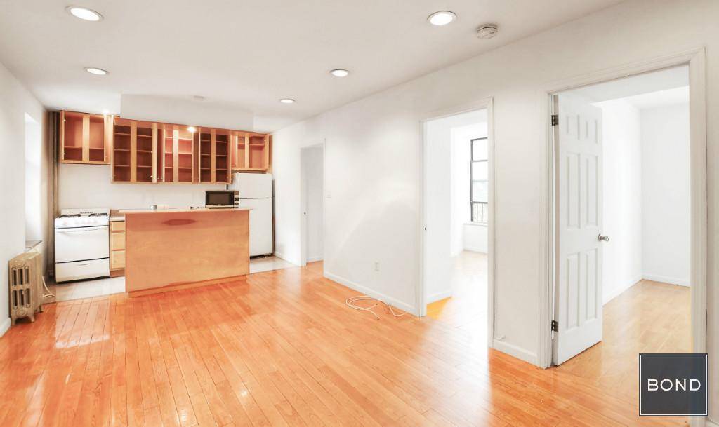 Gorgeous renovated 3 bedroom apartment with oak floors, marble bathroom, and modern appliances and fixtures, all on a prime tree lined block in the heart of the East Village.