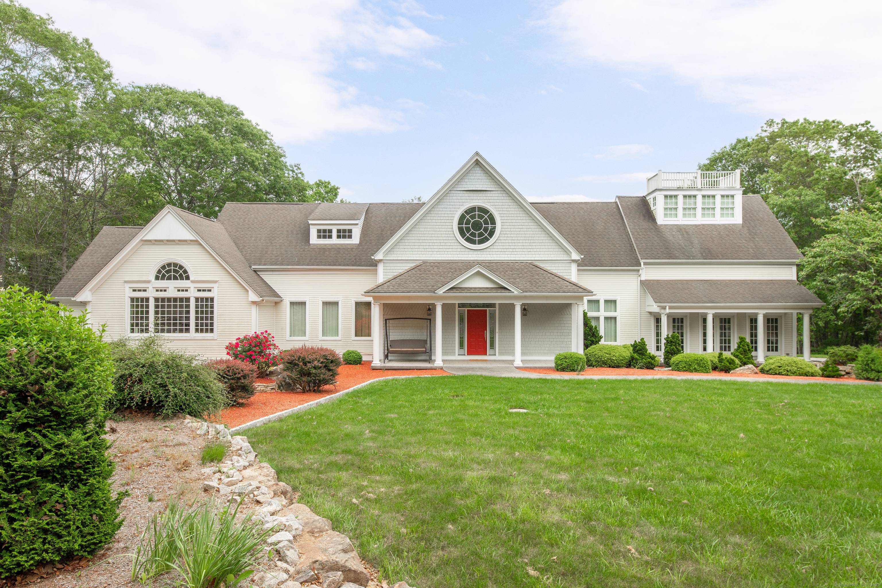 STUNNING COUNTRY ESTATE. Drive back off the road through private entry gates into a park like setting and discover this spaciously designed elegantly appointed home.