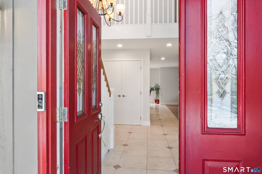 Drive up the circular driveway and discover this spacious, desirable contemporary home bursting with curb appeal, beautifully set on a level, private acre.