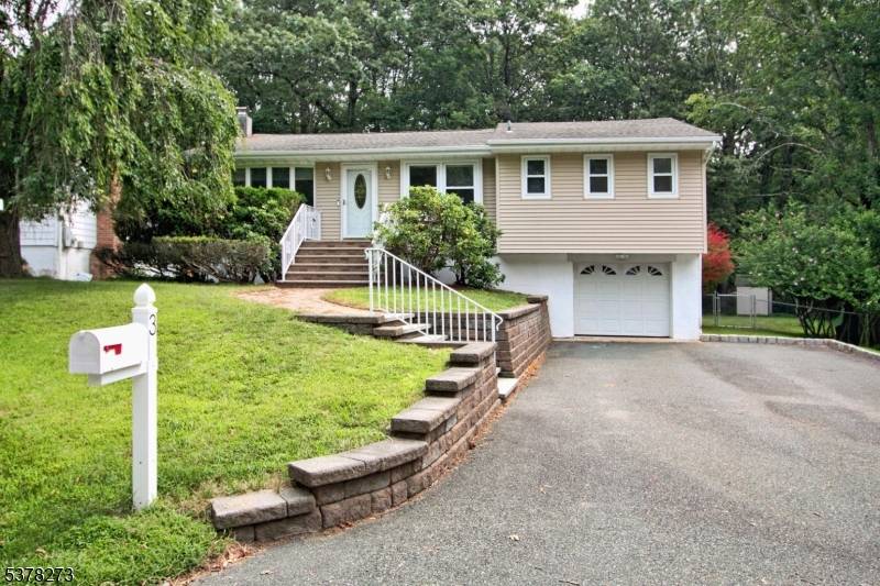 Step inside and feel at home in this bright and inviting 3BR, 2BA Ranch in desirable White Meadow Lake.