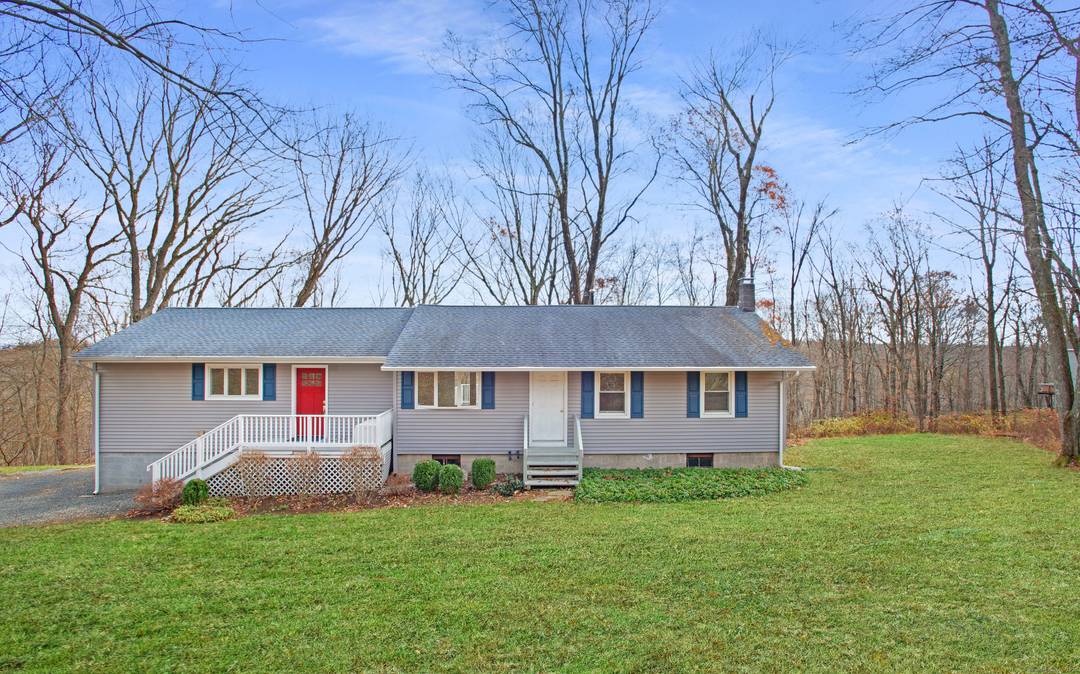 Welcome Home to this single level property offering comfort, convenience, and a serene natural setting just minutes from downtown Ridgefield.