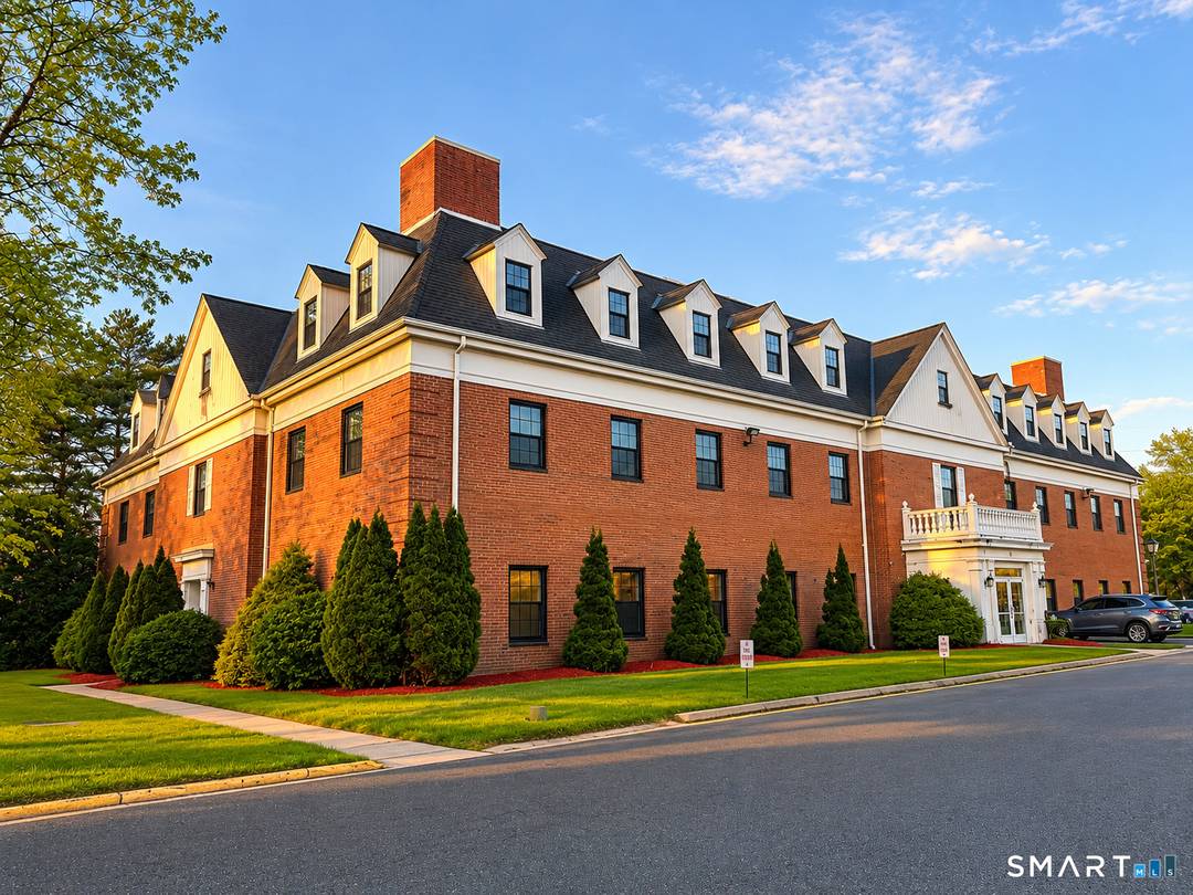 Striking three story brick office building set on a beautifully landscaped, established site in Wethersfield's professional corridor !