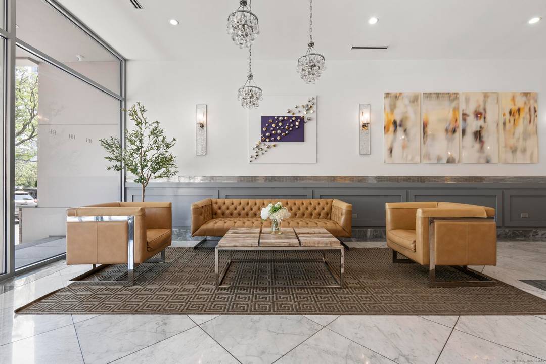 Step into sophisticated city living with this beautifully appointed 2BR 2BA residence in the desirable Hayes House, one of Stamford's most distinguished condo buildings.