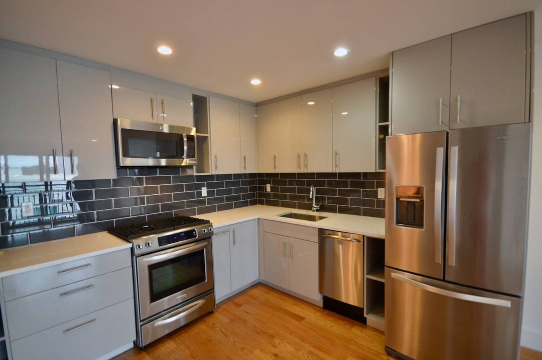 Welcome to your new home at 63 34 Fresh Pond Road.