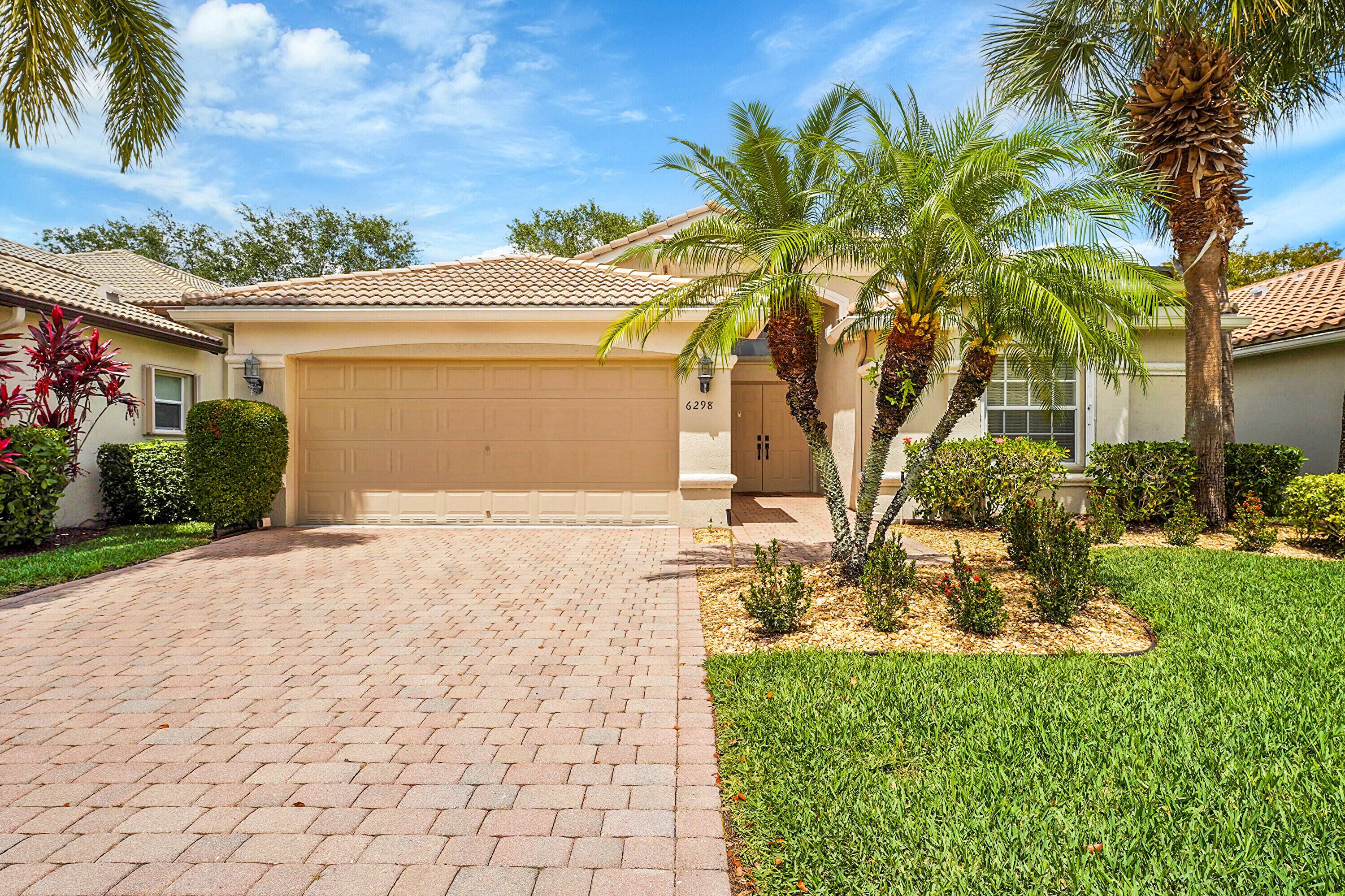 Beautifully upgraded 3BR 2BA Ferrera model offers a spacious open concept design enhanced by vaulted cathedral ceilings, creating a dramatic flow and stunning views of the tree lined, private backyard.