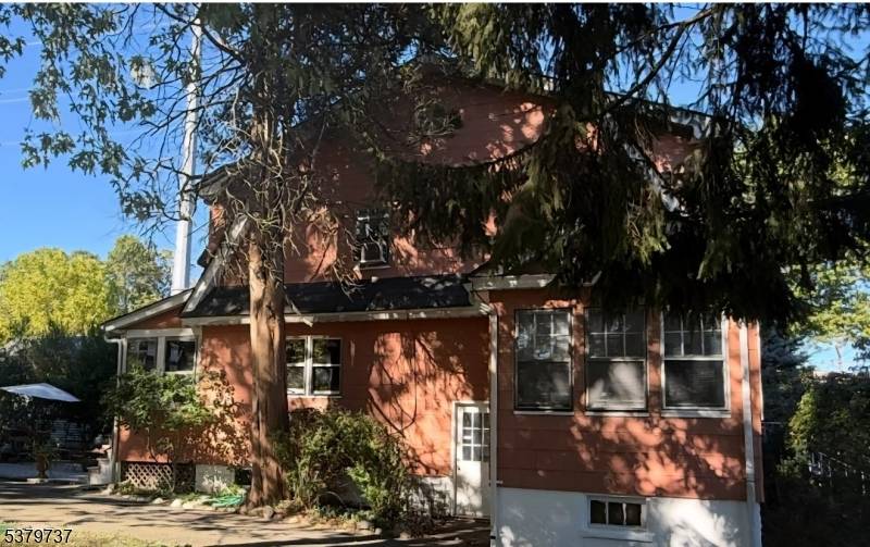 Nestled on an oversized double corner lot, this immaculate turnkey 4 bedroom, 2.