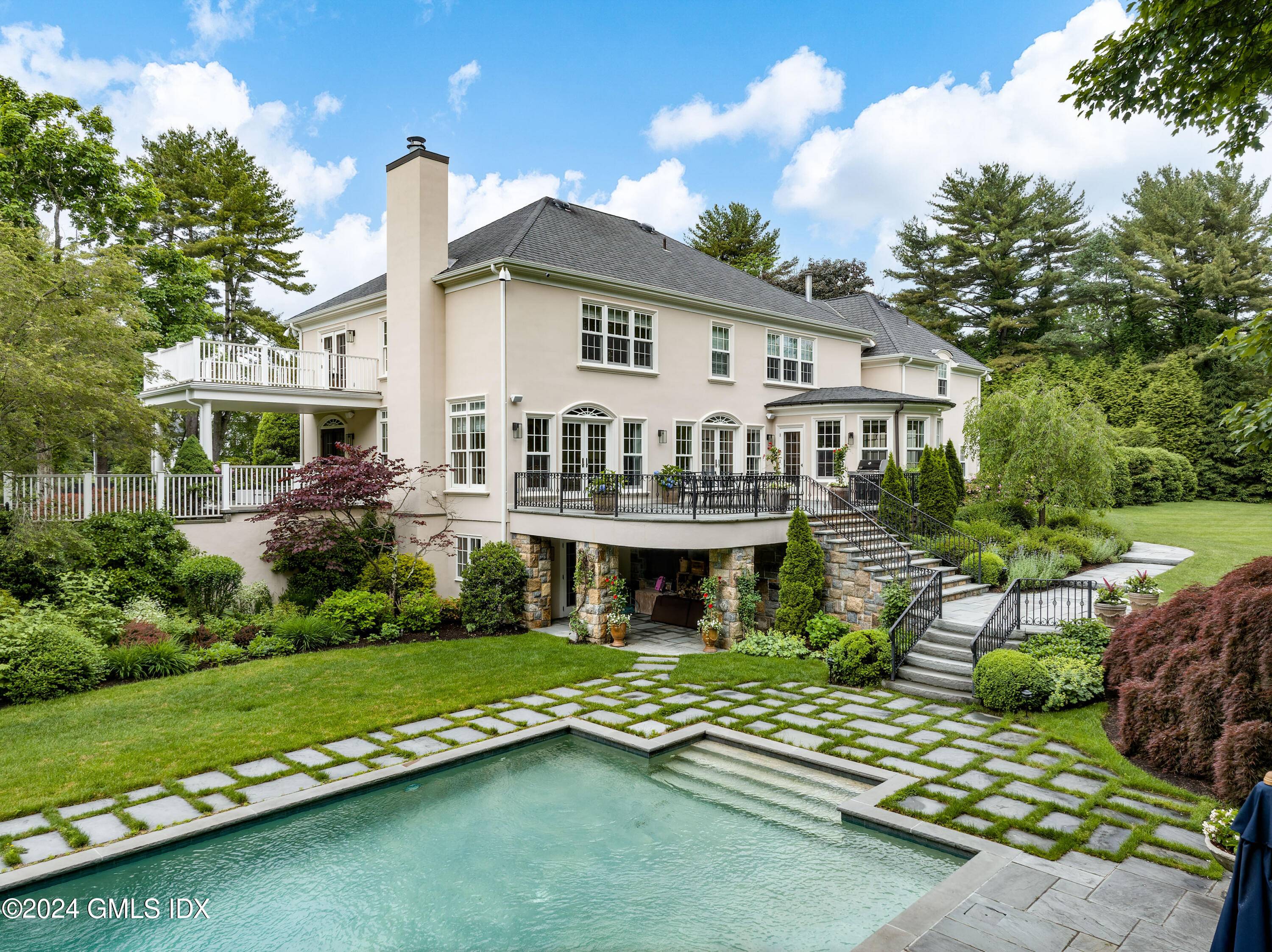 August Labor Day, 2024 spend it in this wonderful 5 bedroom, 5 bath Colonial with pool located in serene backcountry Greenwich Stamford.
