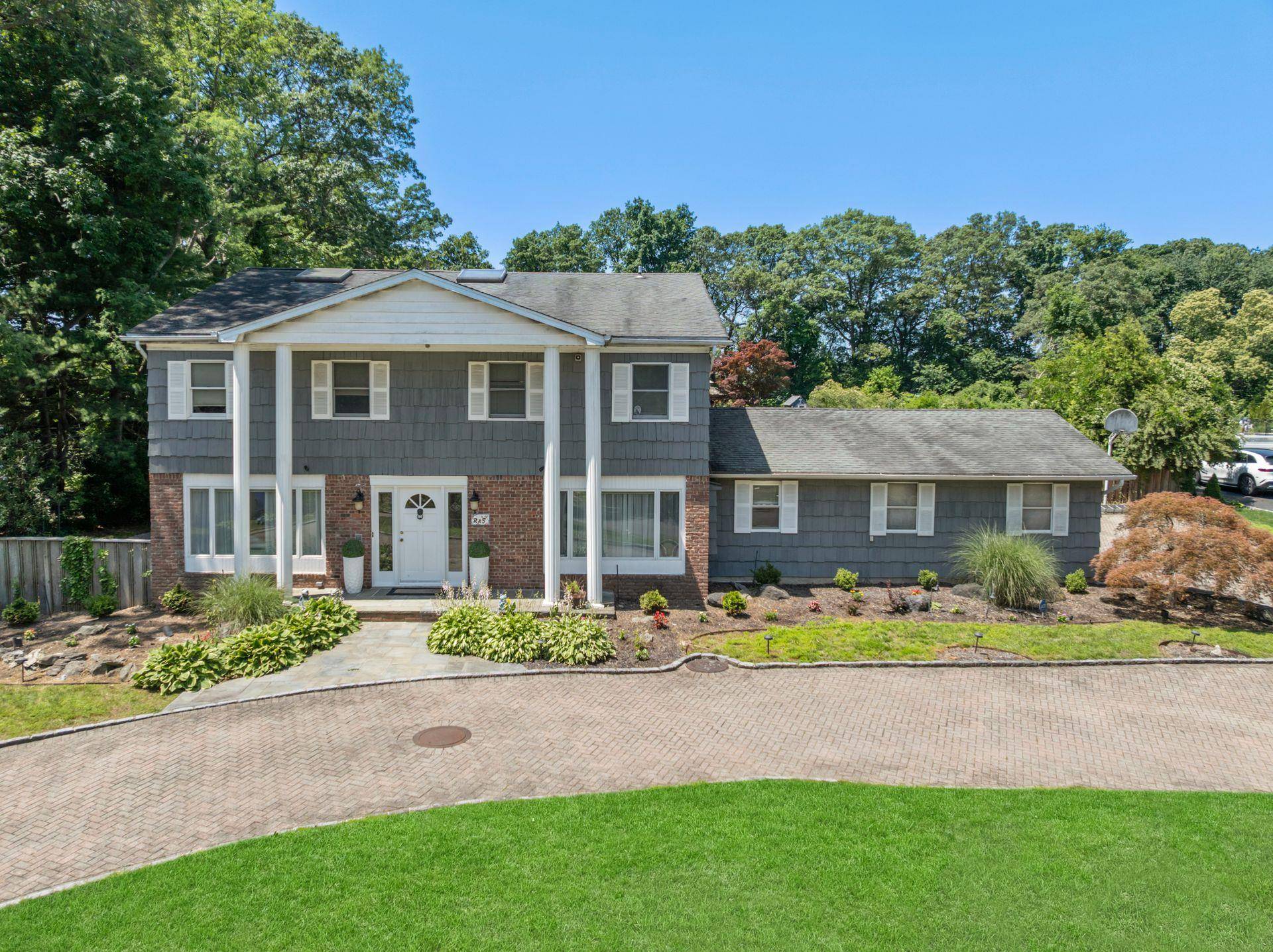 Welcome to 9 Lucille Lane, Dix Hills A Grand Center Hall Colonial on Over an Acre of Paradise Perched high on a picturesque, tree lined block, this mint condition 5 ...