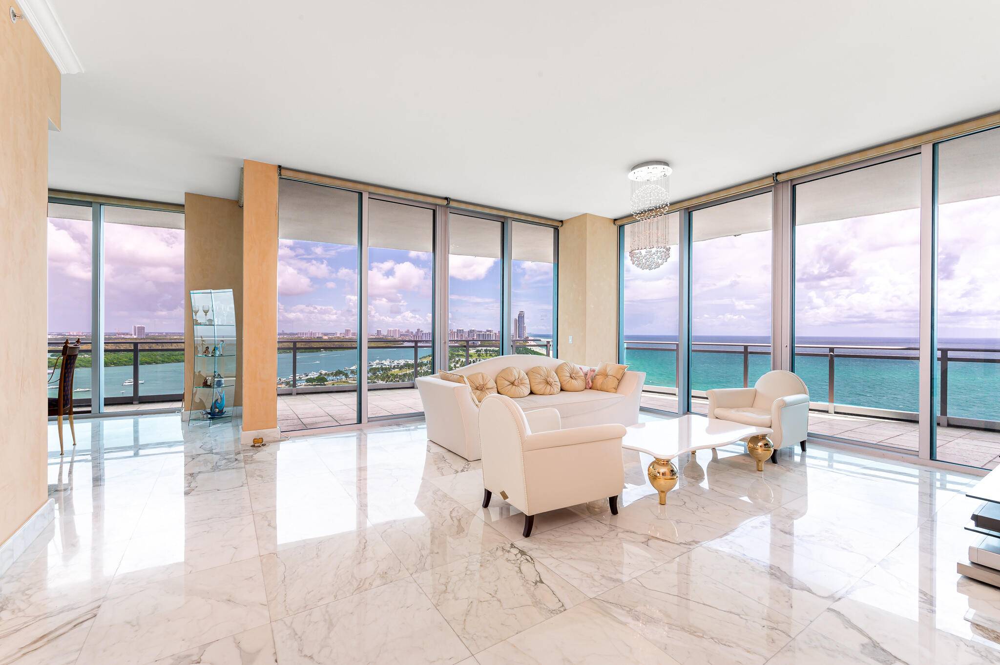 Spectacular unobstructed Ocean and Intracoastal City Views Beautifully designed 3 bedroom, 3.