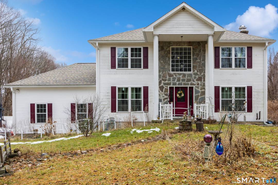 Set on nearly 3 private acres abutting the Bristol Water Company, this beautifully updated Colonial offers space, privacy, and over 300k in thoughtful upgrades.