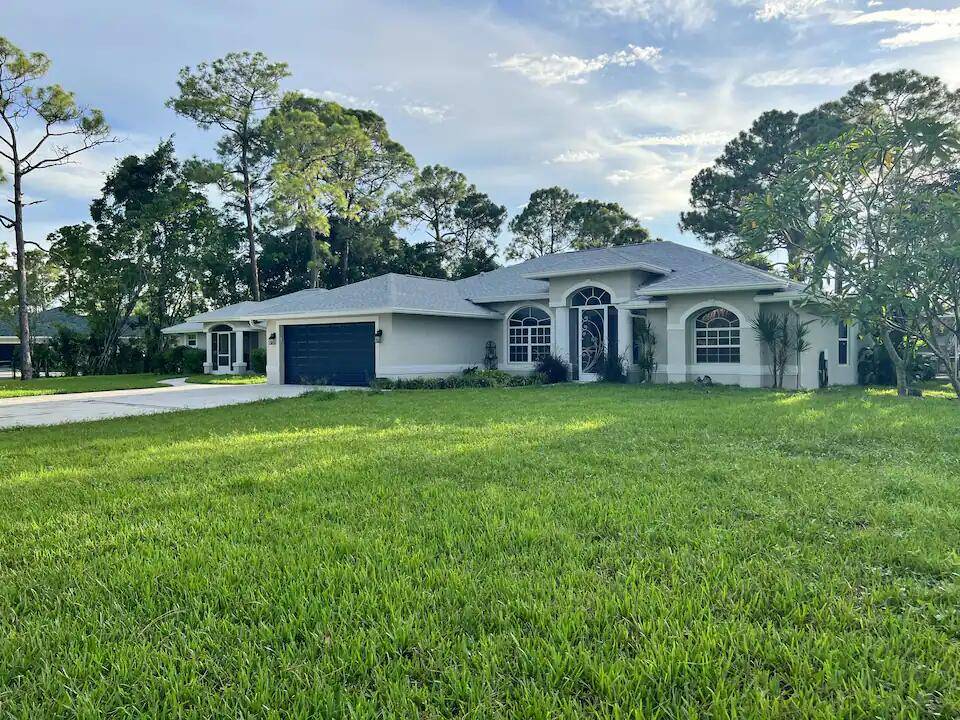 The main house is open and spacious with volume ceilings, 3 bedrooms, den can be 4th bed, 2 bathrooms, open kitchen, inside laundry, full pool enclosure on 1.