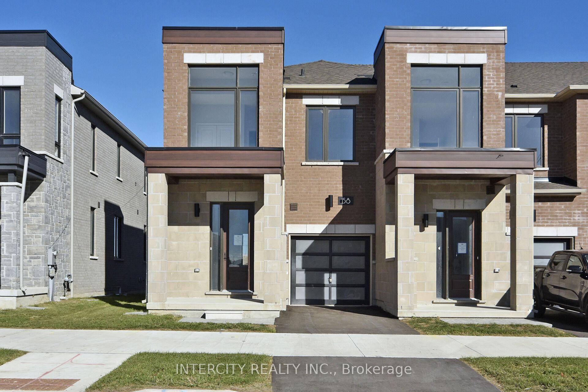 Welcome to this Freehold Luxury Traditional 2 Storey Townhome.