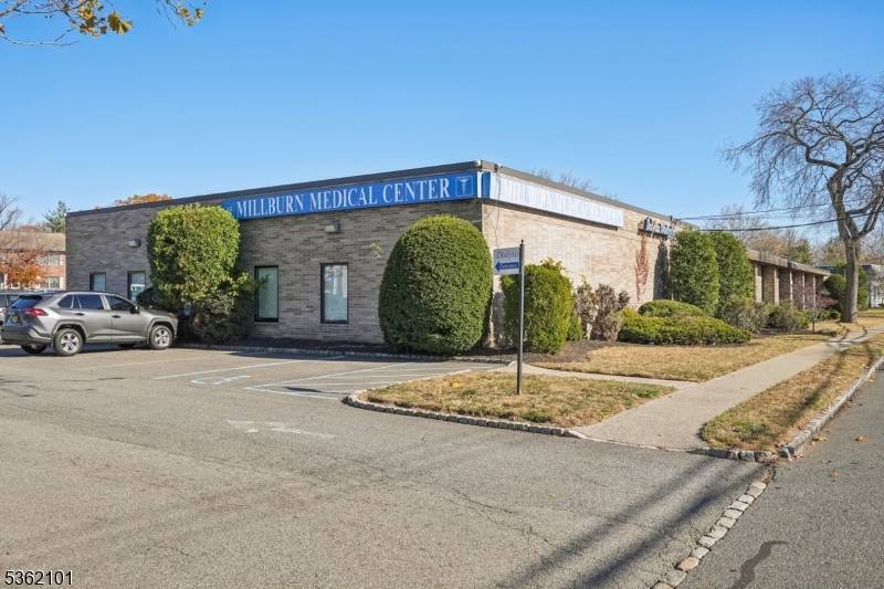 This exceptional property is 1 of a 2 unit semi detached commercial condominium building.