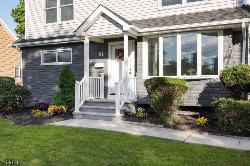 Get ready to fall in love with this sun drenched, turn key home on a quiet, tree lined street in Clark !