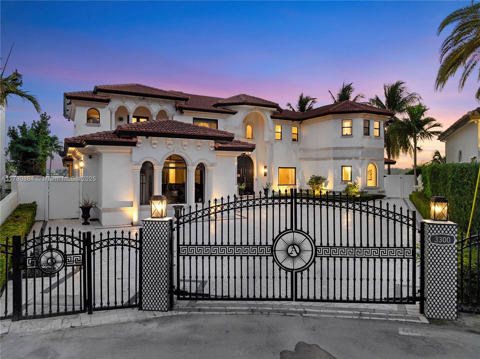 This spectacular waterfront home is located in the prestigious gated community of Eastern Shores.