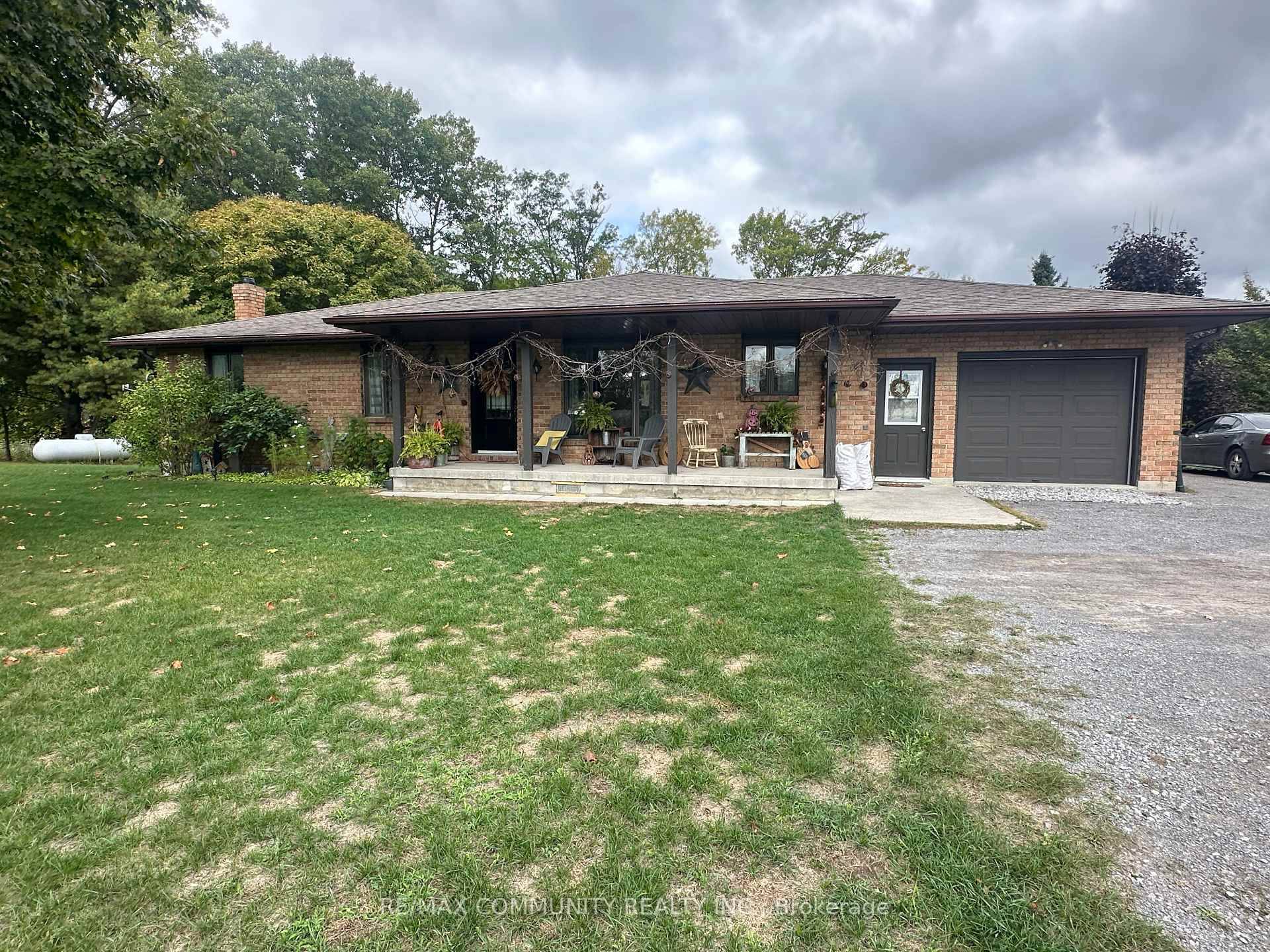 Charming All Brick Bungalow with Walk Out Basement !