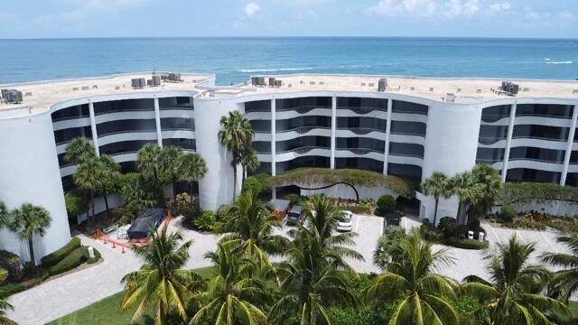 Breathtaking panoramic blue ocean views abound this first time ever on the market, prime location condo in the prestigious Sailfish Point Community.