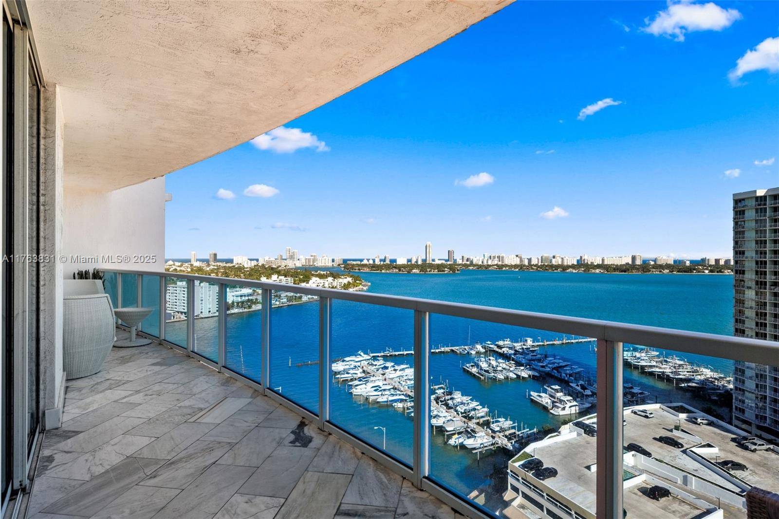 This stunning 2 bedroom, 2 bath condo in North Bay Village offers unparalleled views of Biscayne Bay and the Miami skyline from every room, plus a large private patio.