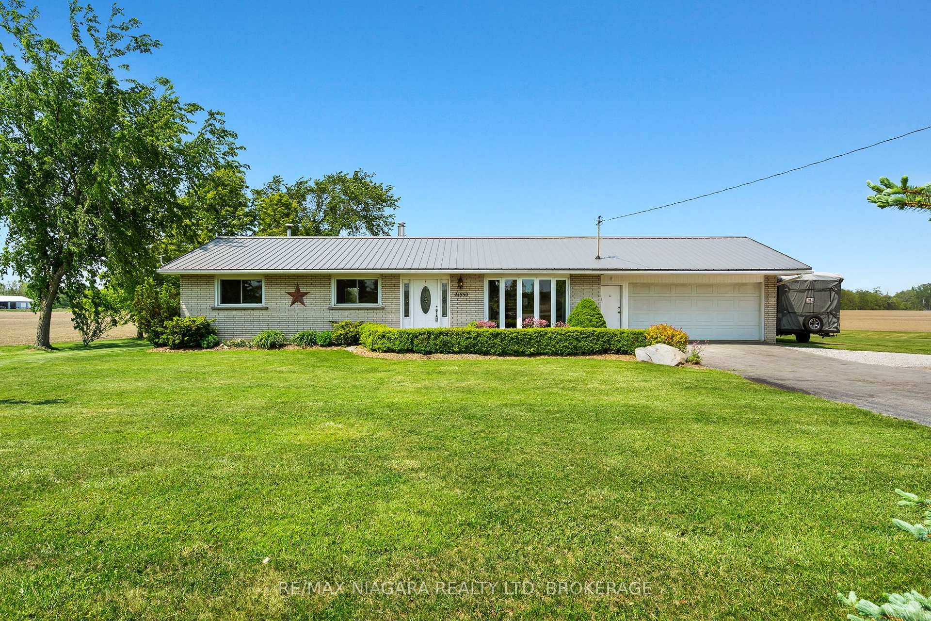 Peaceful Country Living with Modern Comforts 3 1 Bed, 3 Bath Bungalow with In Law Potential amp ; Detached Heated Shop.