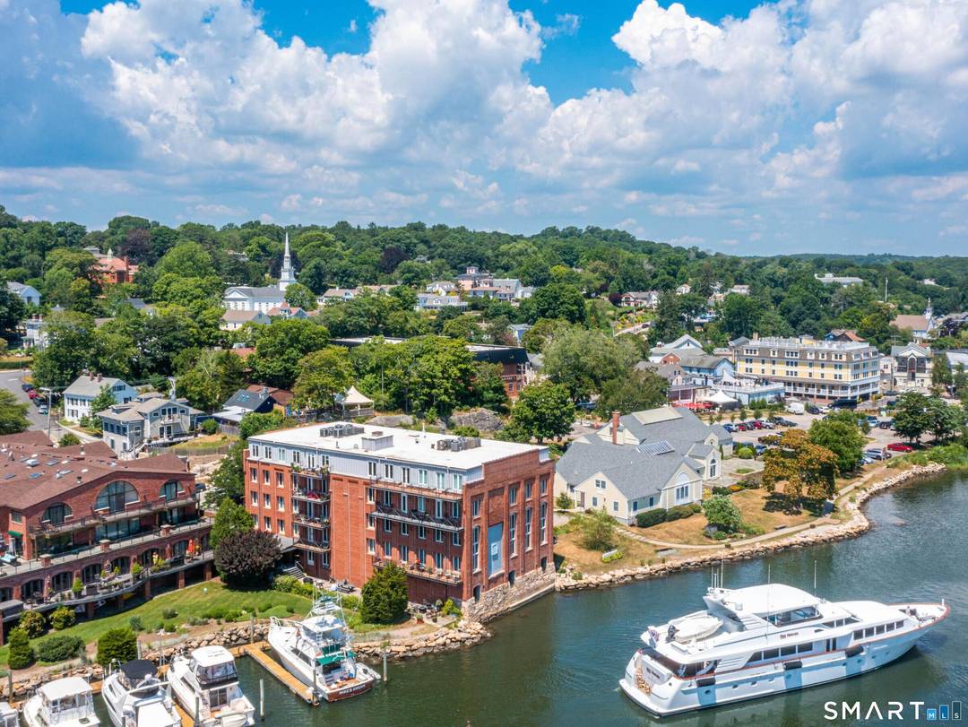 Direct Waterfront One Level Condo with Un Obstructed Water Views of the Mystic River.