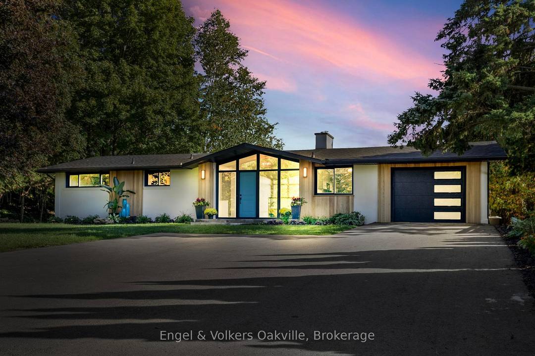 A rare one acre escarpment view estate in the heart of Dundas.