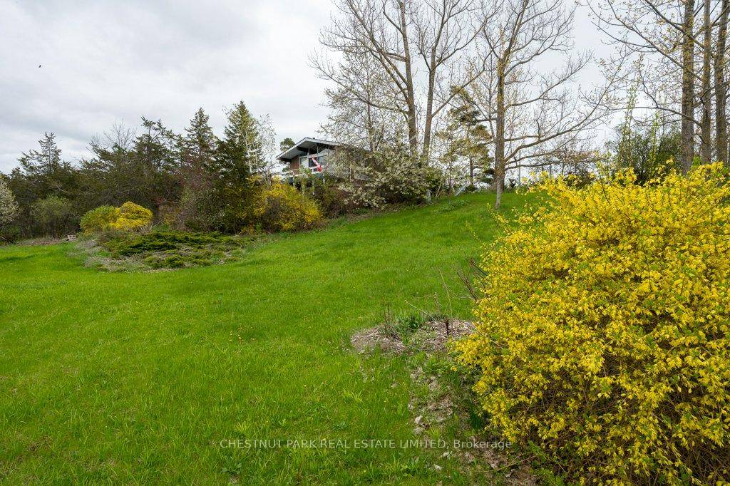 This 2. 6 acre waterfront property offers an incredible opportunity and exceptional value for those looking to create their dream home.