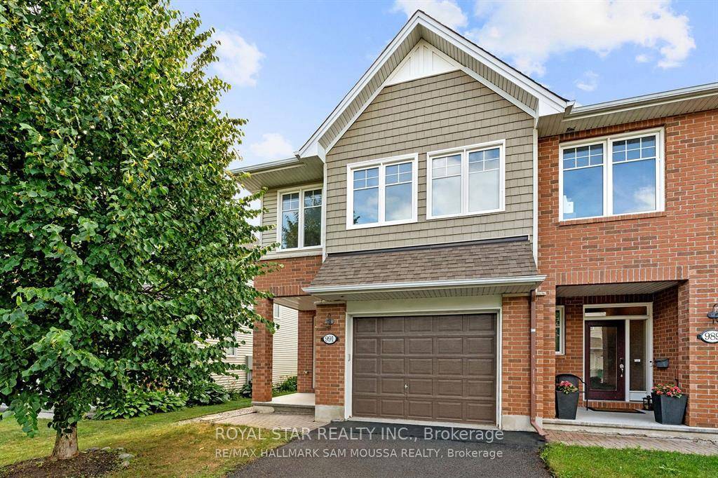 End Unit Townhome in Sought After Findlay Creek Village !