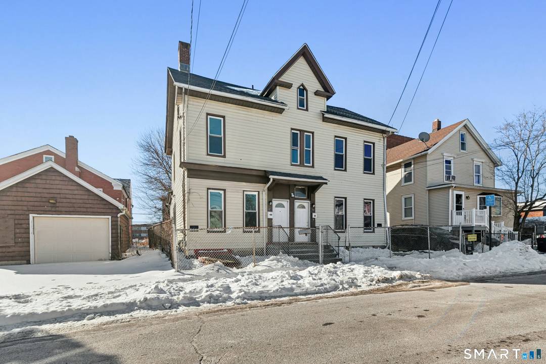 Two family property with extensive renovations completed, offering excellent income potential or a solid owner occupant opportunity.