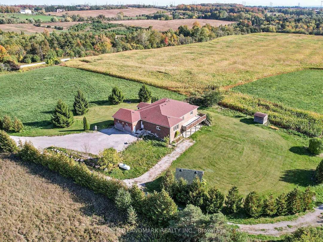 Stunning detached house nestled on over 46 acres of lush, workable farmland, offering both tranquility and convenience with 2 Street address numbers.