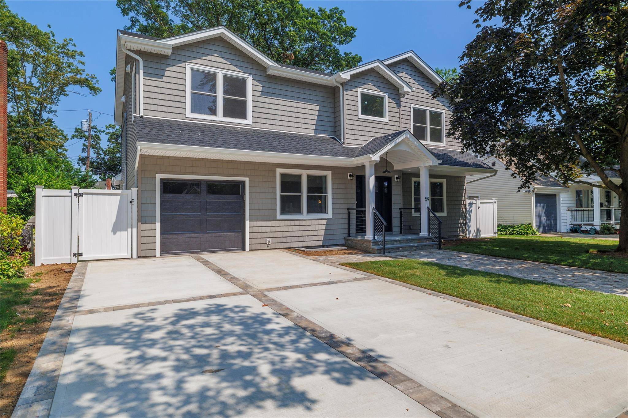 Welcome to this masterfully crafted Colonial located in the heart of the highly sought after Wenshaw Park neighborhood in North Merrick.