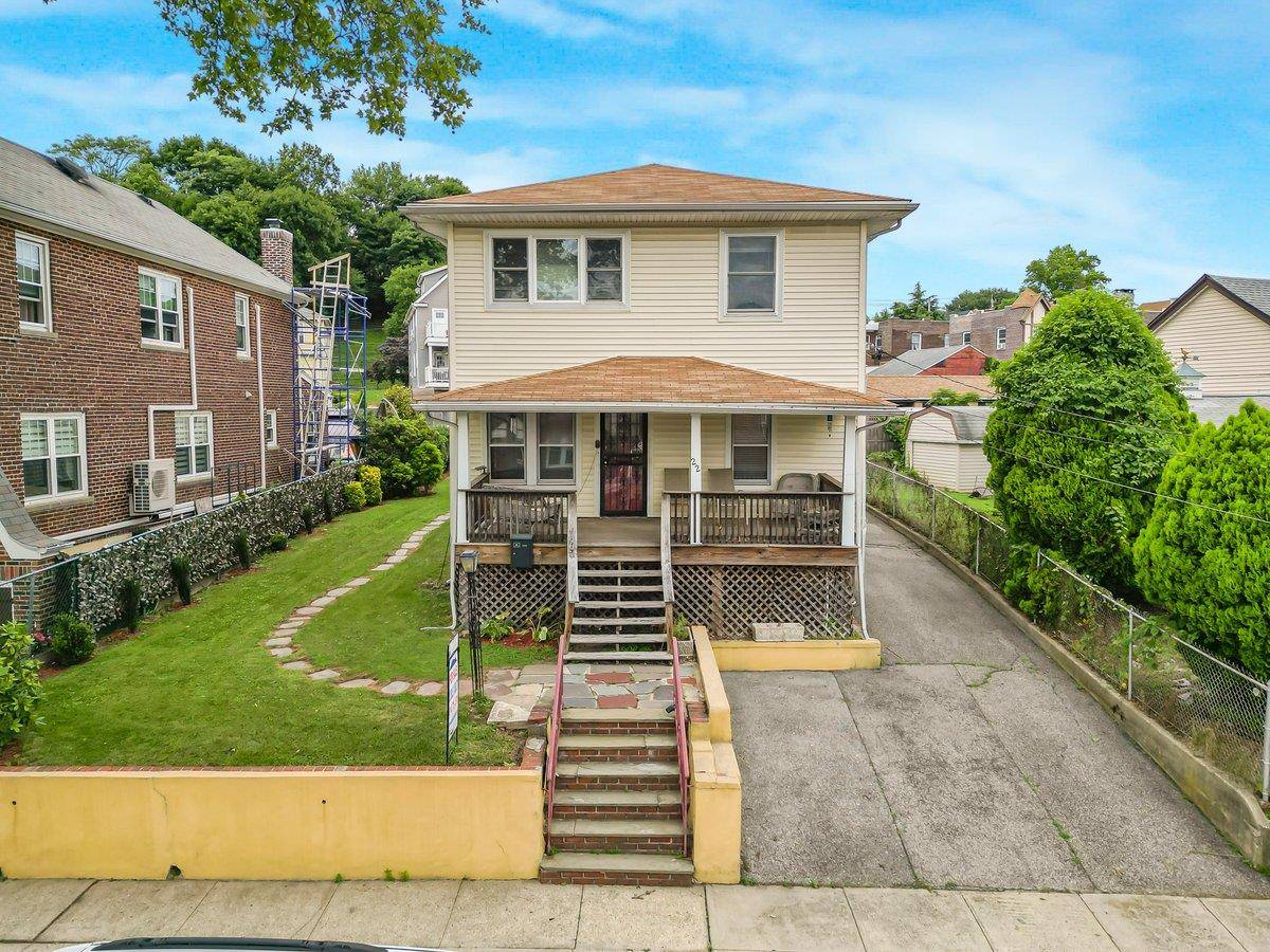 Discover this wonderful 2 Family Home nestled away in the heart of McLean Heights featuring a huge driveway and a 2 Car garage.