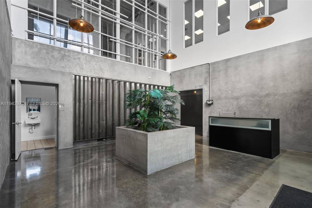 Fully air conditioned office warehouse totaling 7, 247 SF, featuring a modern 2, 894 SF two story office build out constructed with shipping containers.