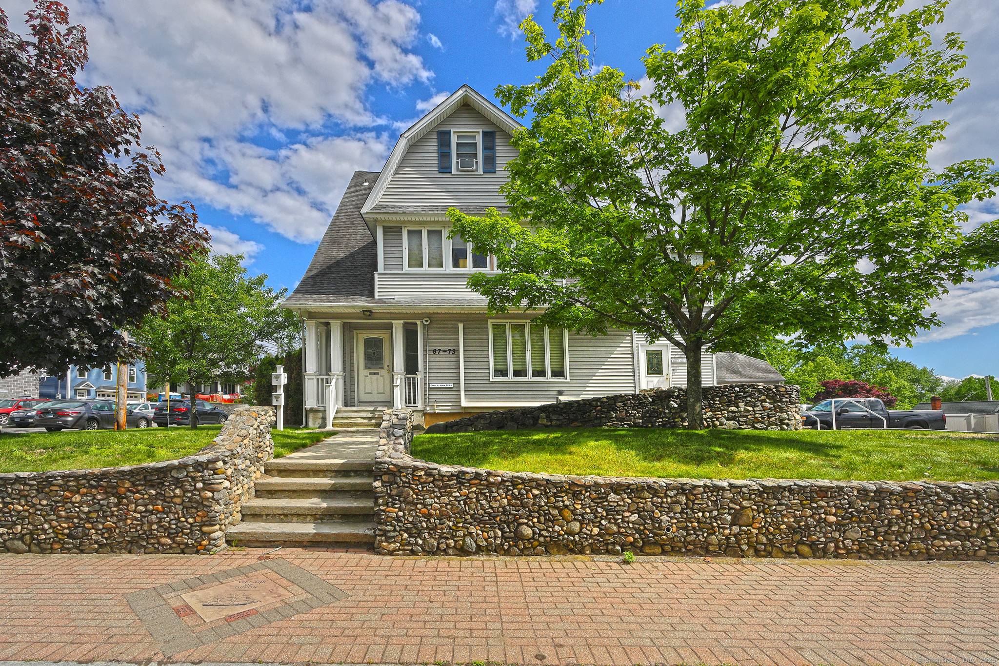Location, Location. Location, Commercial building with first floor office, 3 rentals units, 5.