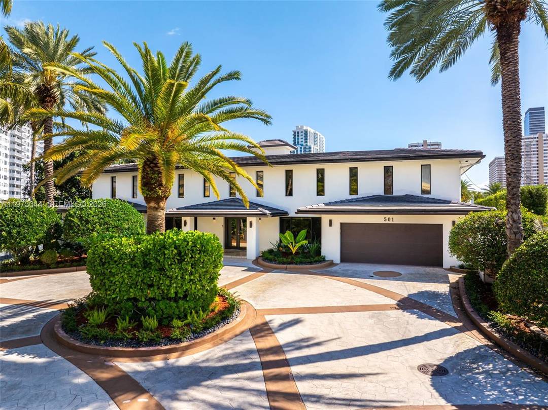 Exceptional waterfront estate in the prestigious Golden Isles community of Hallandale Beach.