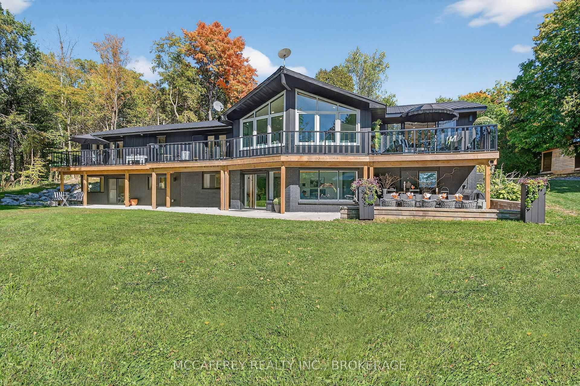 Welcome to your private lakefront sanctuary where elegance, scale, and serenity meet.