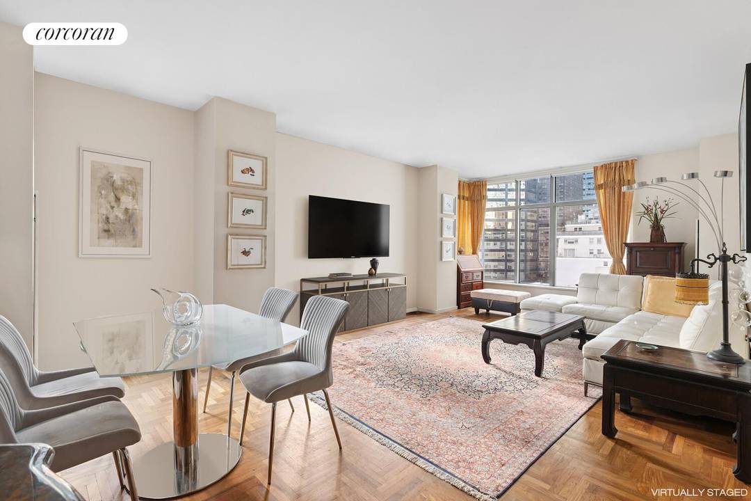 Spacious and unique three bedroom three bathroom corner unit in one of the most desirable condo buildings in Midtown East !