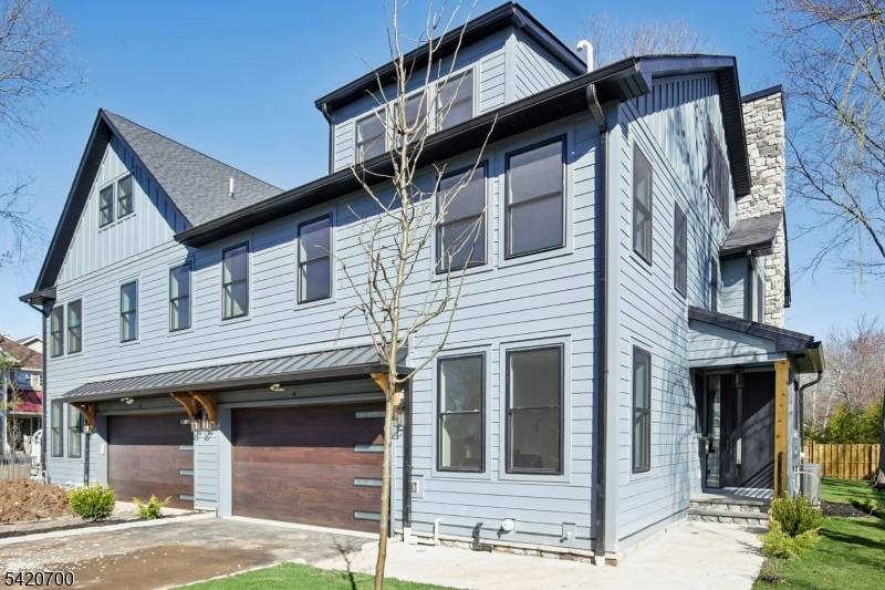 Welcome to Central Villas, a refined end unit townhome in the heart of New Providence, a seamless blend of modern design effortless living.