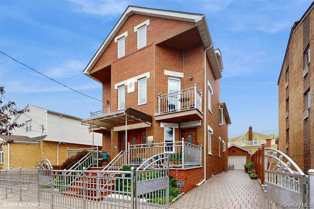 Experience elevated living in this stunning custom built two family Duplex residence.