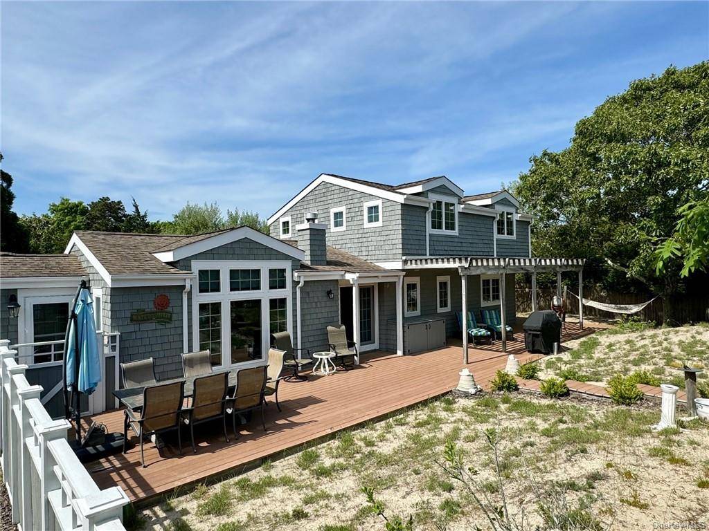 Nestled in the serene and prestigious area of the Amagansett Dunes, this exquisite 4 Bedroom, 3 Bath Colonial on Mako Lane offers the perfect blend of Luxury and Tranquility.