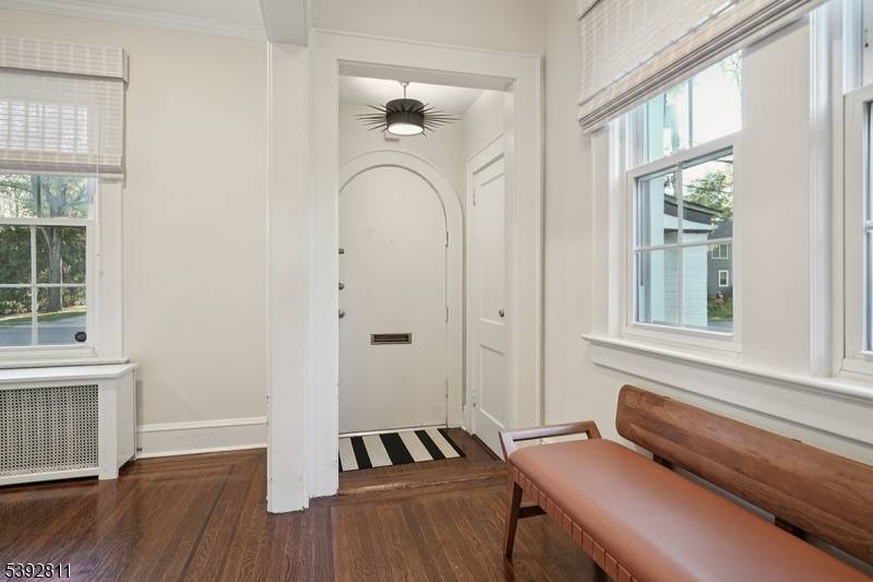 Charming renovated 4 bedroom tudor with large level private rear yard.