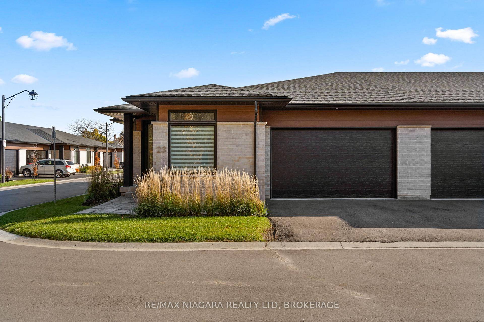 Welcome to this beautifully maintained end unit bungalow townhouse, offering easy, low maintenance living.