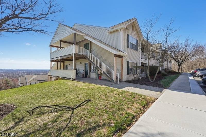 Enjoy the convenience of one floor living in this well laid out two bedroom, two bath end unit at The Woods at King Court.