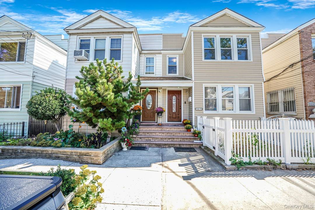 Beautifully maintained legal 2 family home in the heart of Ozone Park !