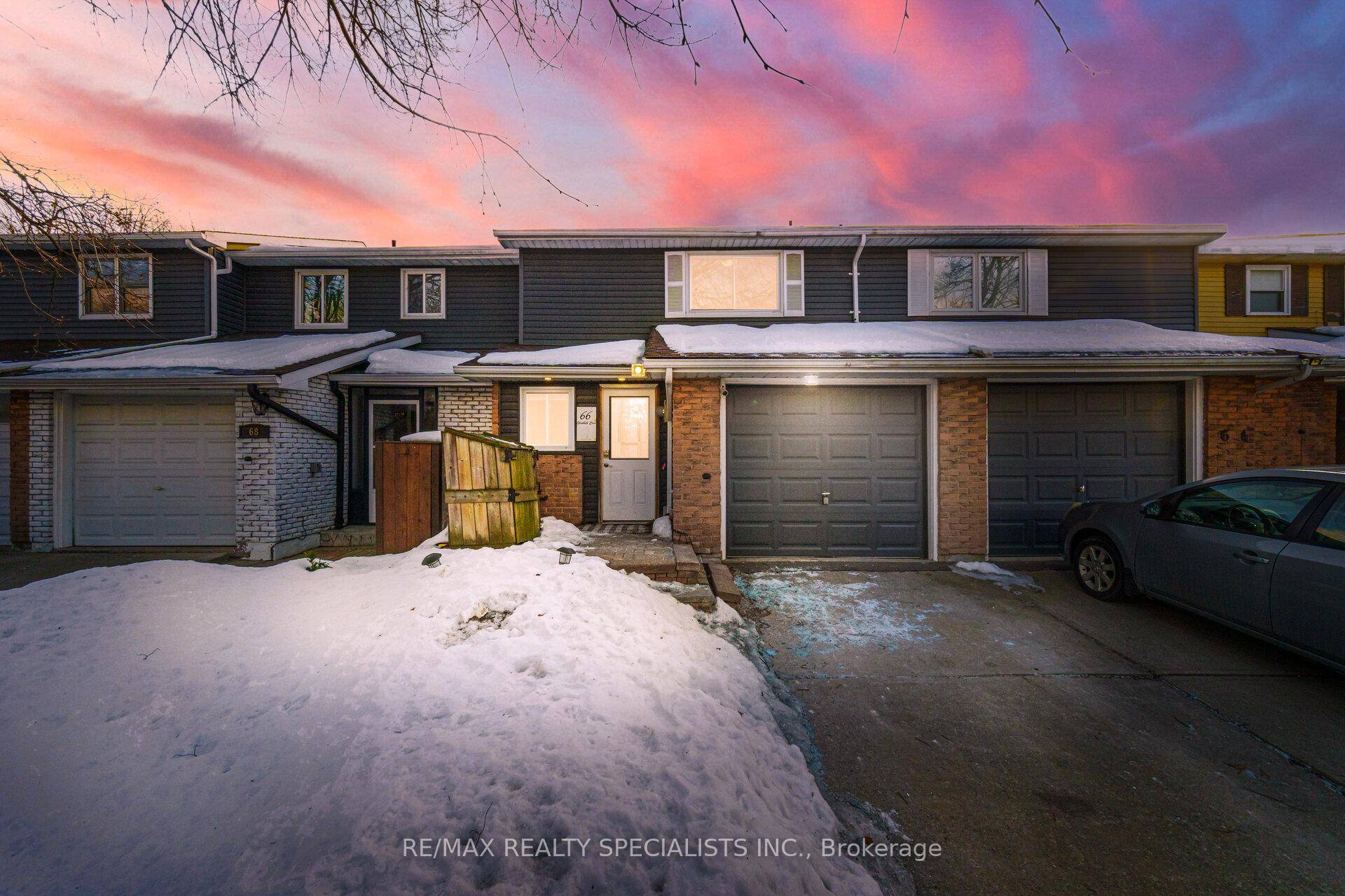 Freehold townhome with no condo fees on a premium 150 ft deep lot with no rear neighbors !