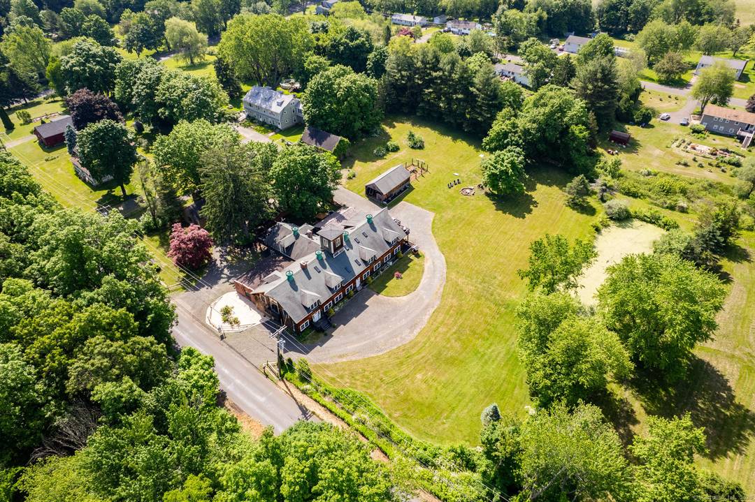 Welcome to your dream retreat nestled among lightly wooded surroundings with picturesque pond views !