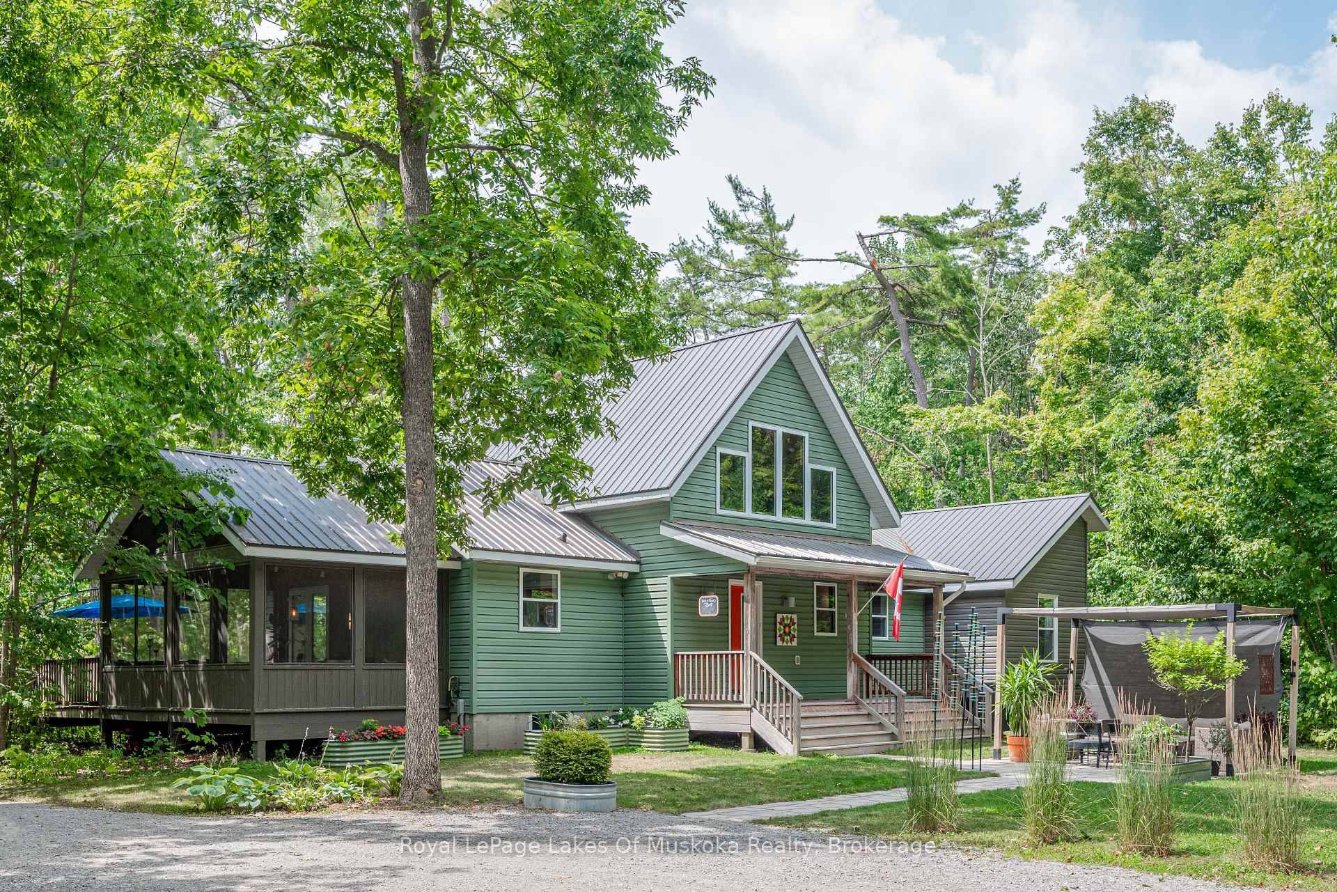 This spacious 2, 000 square foot contemporary home offers vaulted ceilings, an abundance of natural light, and main floor living all just steps or a short bike ride from lakeside ...
